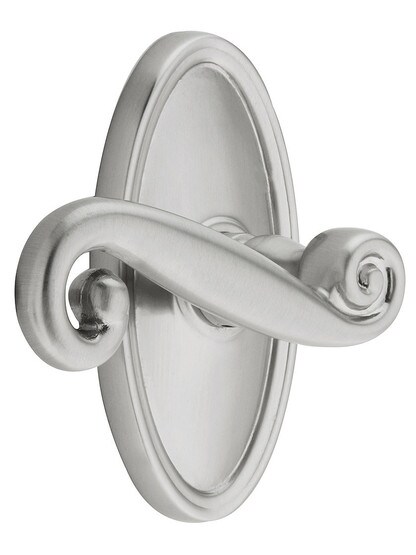 Oval Rosette Set With Scroll Design Levers Left Hand in Satin Nickel.